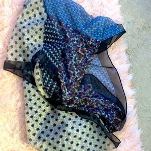 Fashionable multi 4 patterned long scarf. Blues, muted pinks, black.